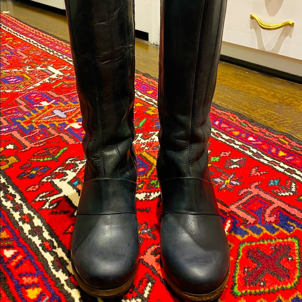 Black leather Olukai woman’s Kumukahi  boot.